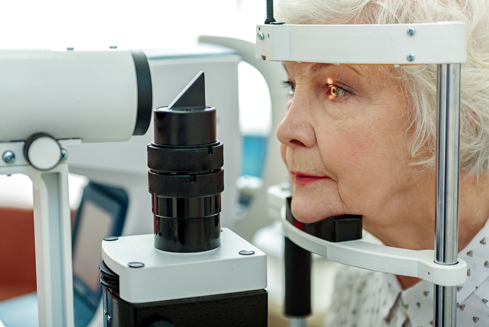 Woman getting an eye exam to test for Glaucoma.