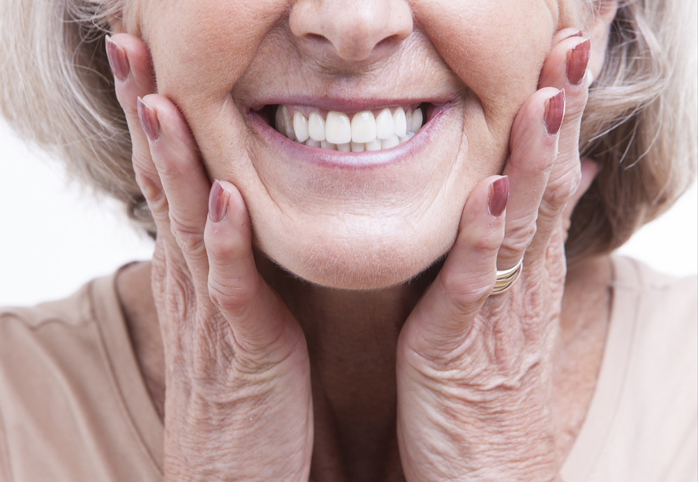 Senior woman with white teeth