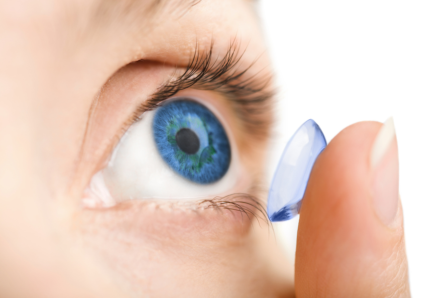 girl putting in a contact lens in Maple Ridge
