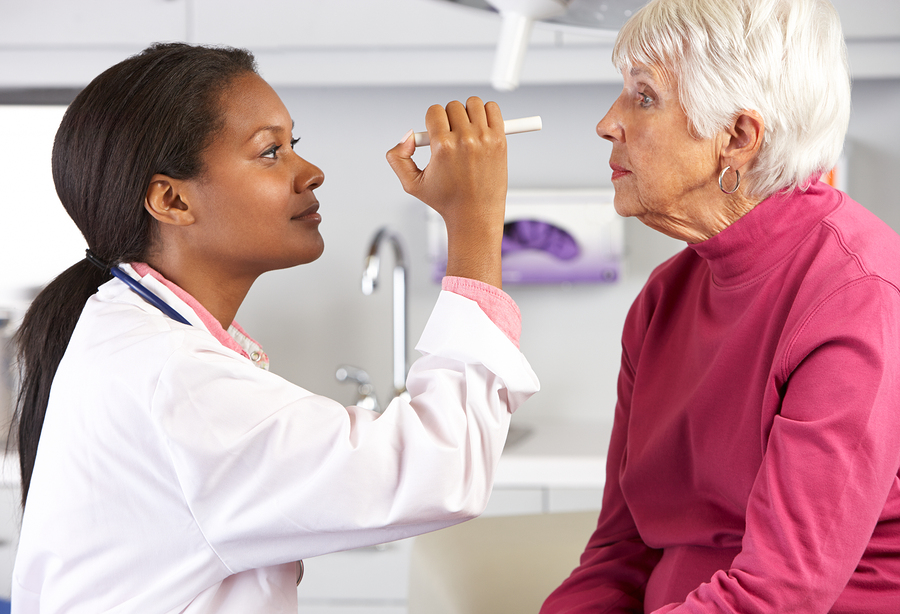senior woman getting an eye health exam in Maple Ridge