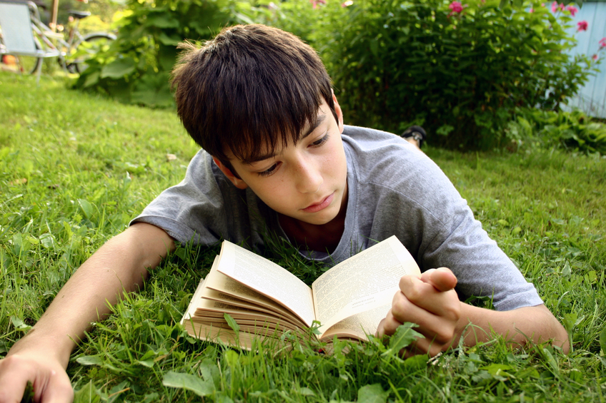 boy reading a book in Ashburn, VA