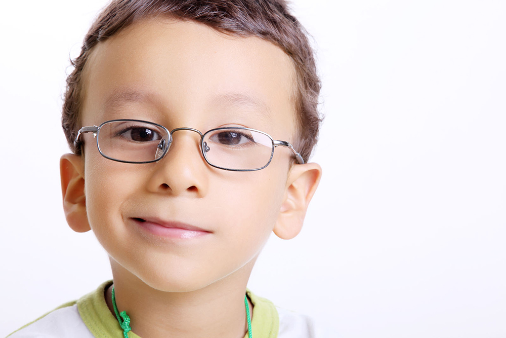 child with glasses