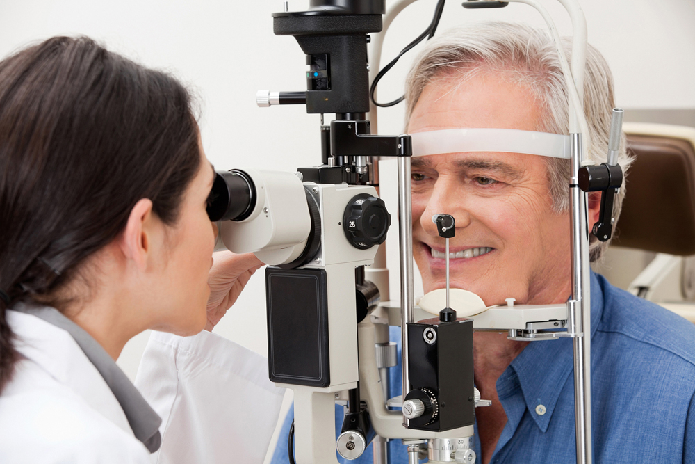 man getting eye exam for cataract