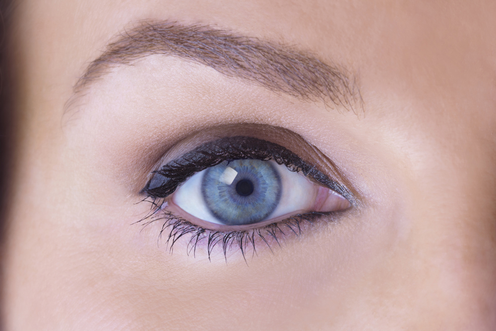 closeup of woman blue eye