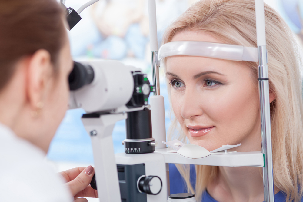 Woman getting an eye exam.